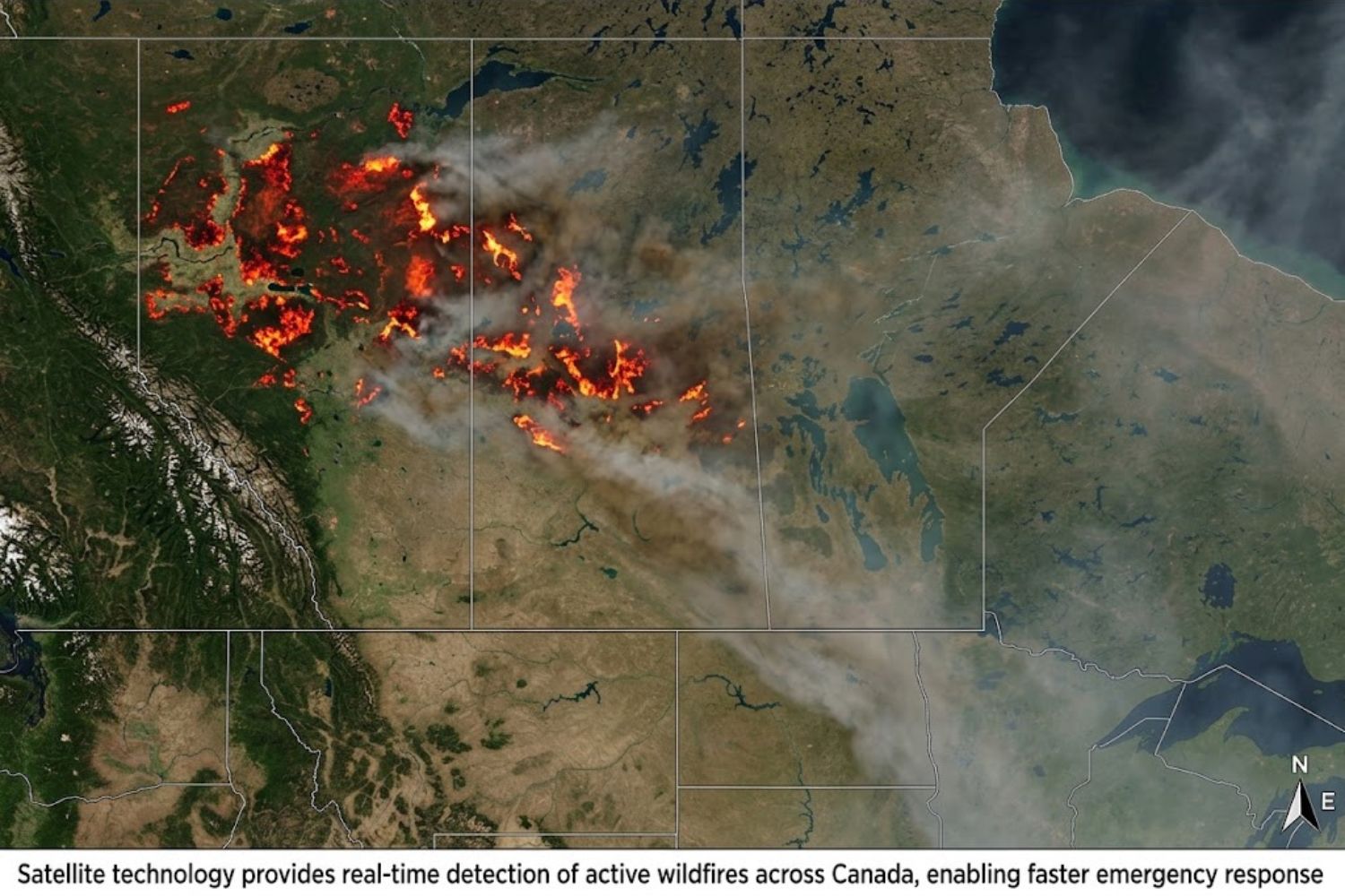 Satellite thermal imaging of active Canadian wildfire showing heat signatures in red and orange, with smoke plumes extending eastward toward USA